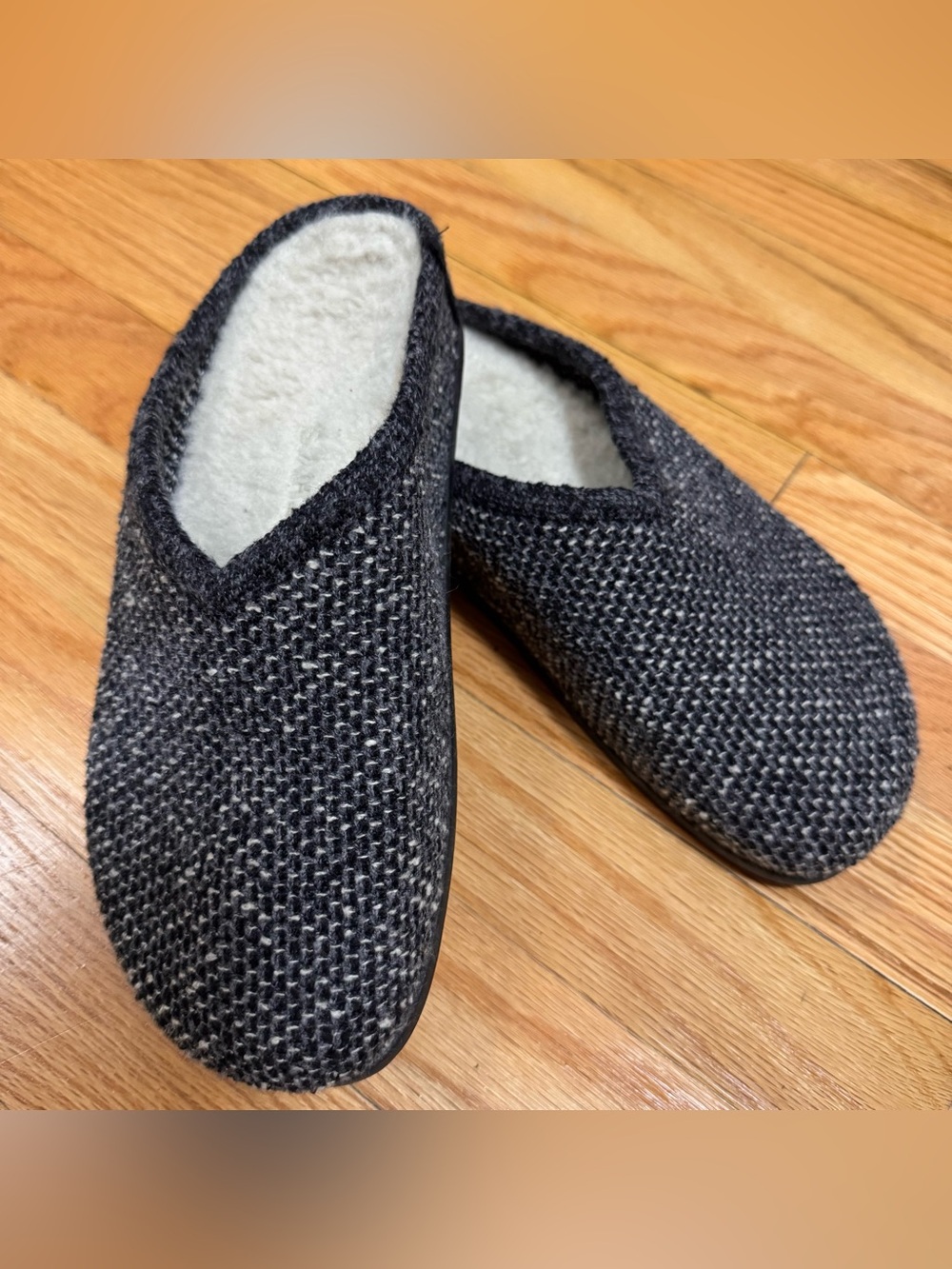 Rothy's The Cozy Clog in the black sesame bouclé colorway. 7